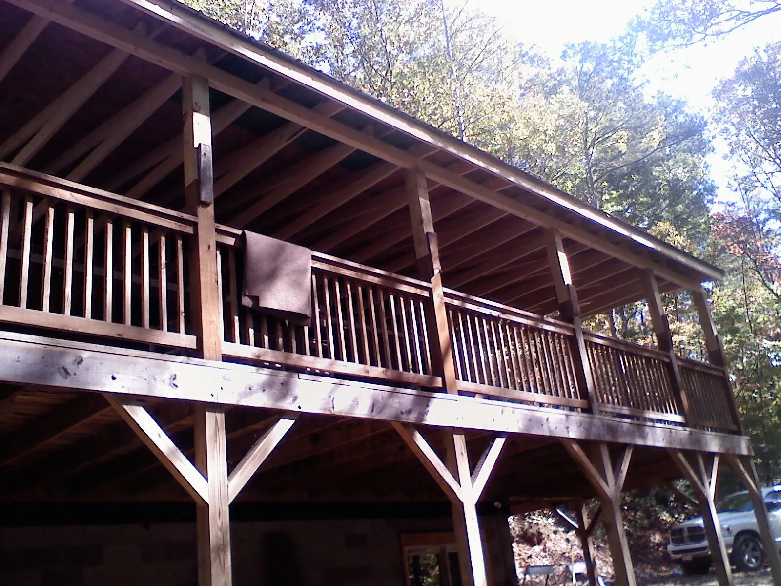 Timber framing under a new elevated porch and deck — Roof Leak Repair in Kent by Roofing Brothers